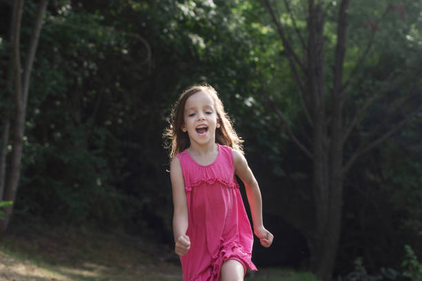 istock Girl running in the nature 1341447486