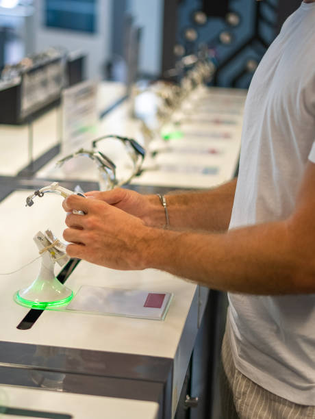 istock Buyer examining smartwatch in store 1341448856