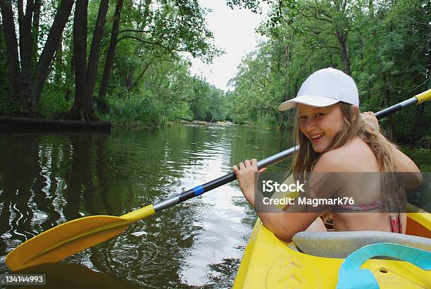 Adolescente Sonriente En Canoa Foto de stock y más banco de imágenes de Kayak - Barco de remos - Kayak - Barco de remos, Polonia, Adolescente