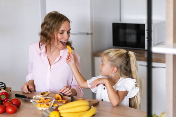 istock A mother and daughter in the kitchen 1341454561