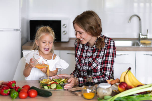 istock A mother and daughter in the kitchen 1341454563