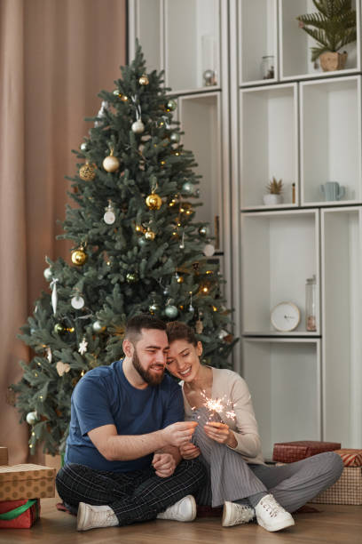 istock Lighting Sparklers At Christmas 1341457746