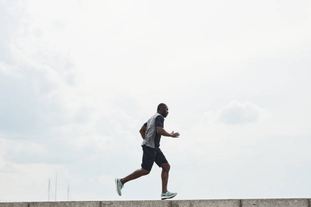 istock Man jogging in the morning 1341458055
