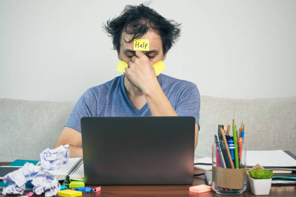istock Asian man in panic sitting and stressful work when working from home 1341459538
