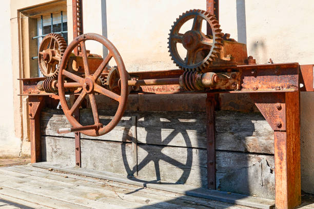 Rusty wheels of a vintage flour mill