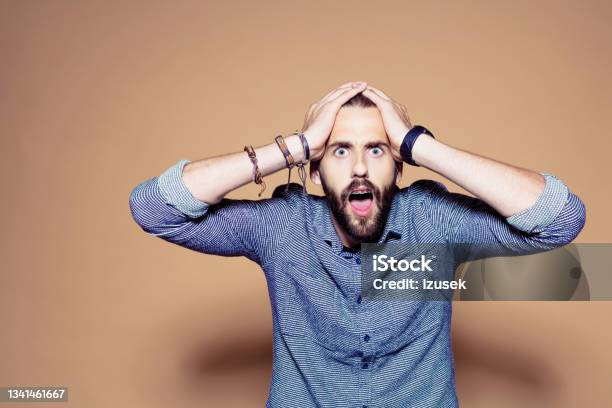 Portrait Of Shoced Bearded Man Stock Photo - Download Image Now - Shock, Men, Facial Expression