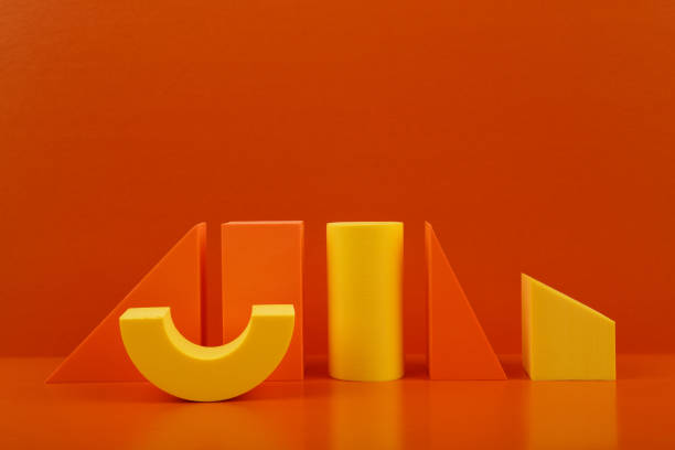 istock Abstract duotone geometric composition with orange and yellow figures on orange background with copy space 1341464586