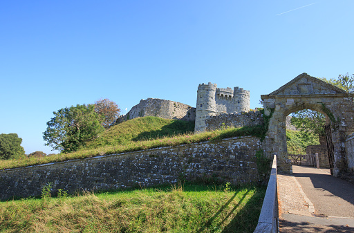 Carisbrooke Castle, Isle of Wight, 2021.   Carisbrooke Castle  has been an artillery fortress, king's prison and a royal summer residence, it is now a popular tourist attraction.