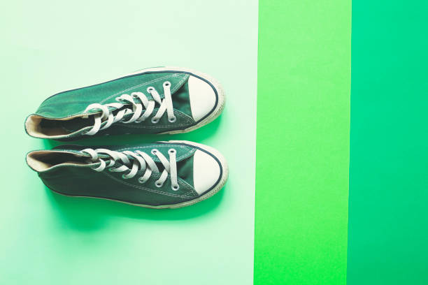 istock Color sneakers on the isolated color background. 1341467566