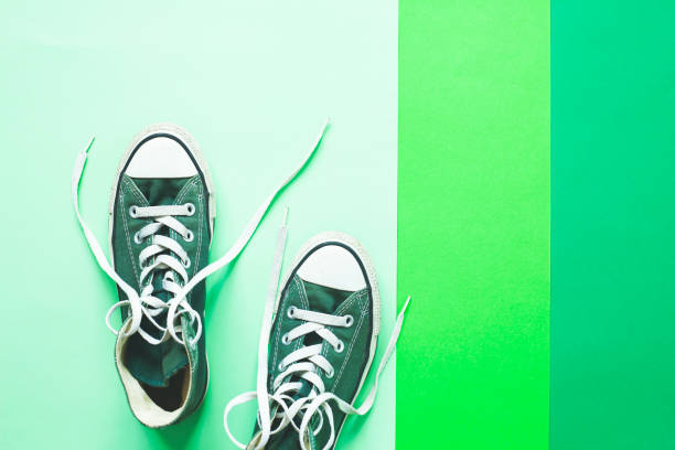 istock Color sneakers on the isolated color background. 1341467567
