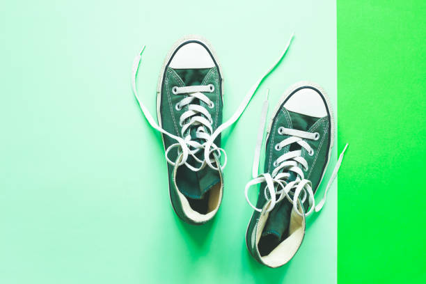 istock Color sneakers on the isolated color background. 1341467588