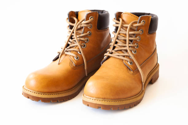 istock Light brown leather shoes on a white background 1341467835