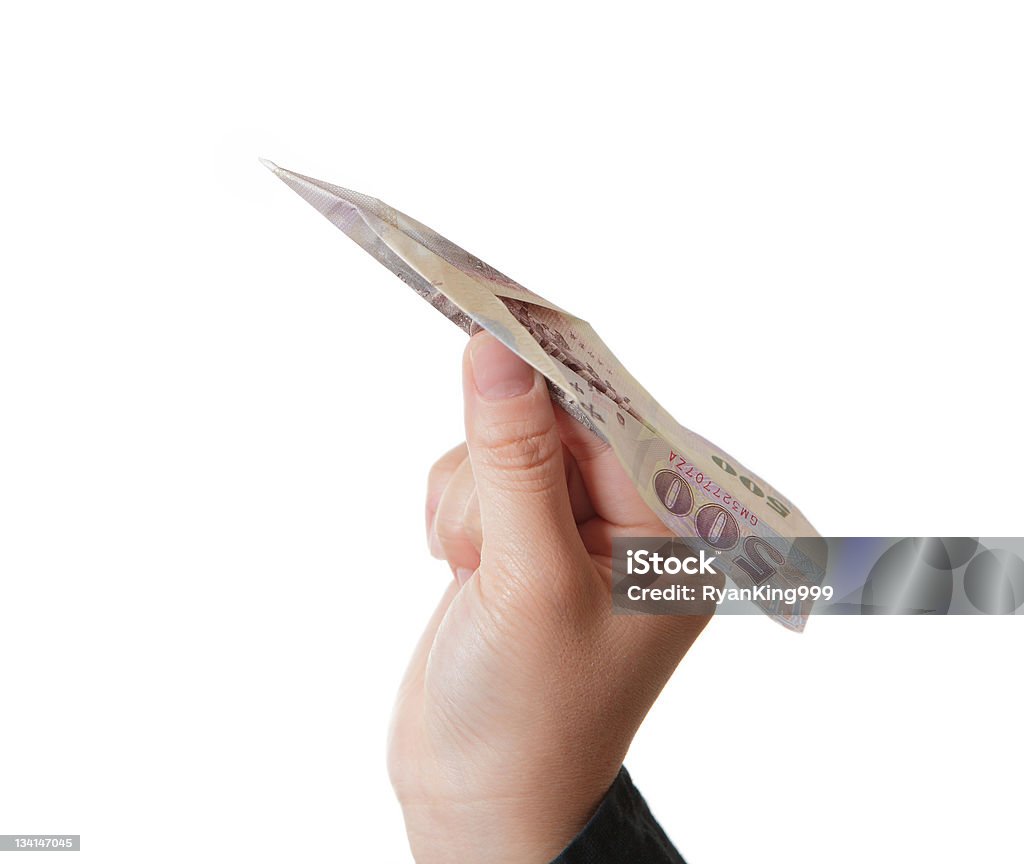 Ręce i pieniądze plane (NT 500 dolarów) na białym tle - Zbiór zdjęć royalty-free (Banknot)