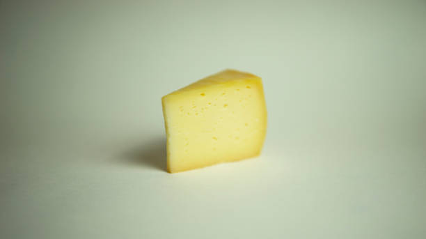 istock slice of hard yellow cheese 1341472247