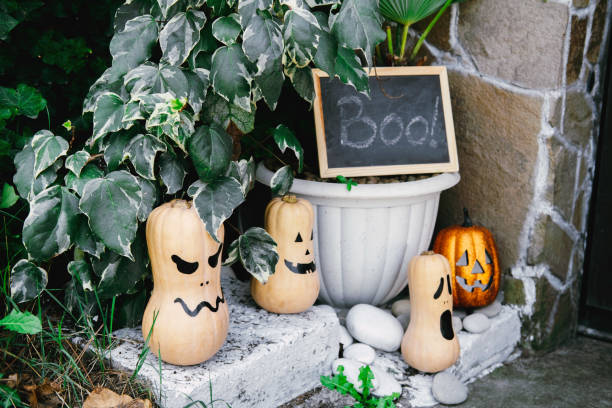 istock Halloween pumpkins decorated house entrance. 1341475257