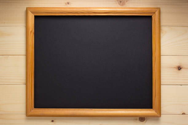 istock photo picture frame at wooden background 1341475952