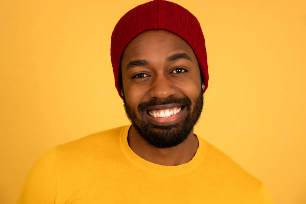 istock Afro man looking at the camera and smiling. 1341478879