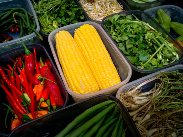 istock High angle view of colorful raw vegetables in storage boxes 1341484629
