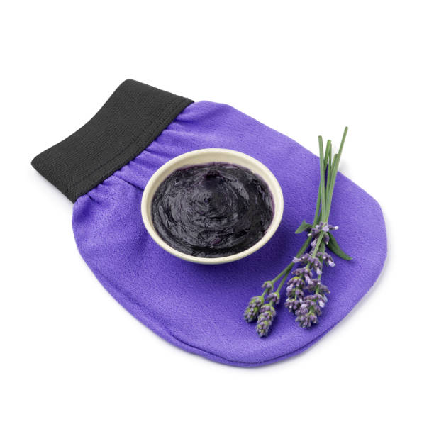 Bowl with savon beldi with lavender on a traditional washcloth Bowl with savon beldi with lavender washcloth on white background savon stock pictures, royalty-free photos & images