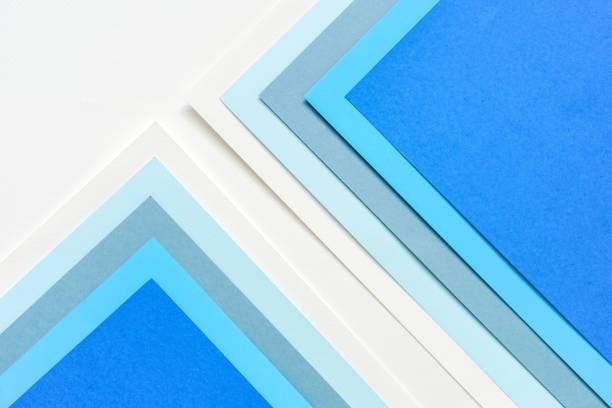 istock On a white background, an abstract background concept with a geometric pattern in various hues of blue paper stacking 1341493155
