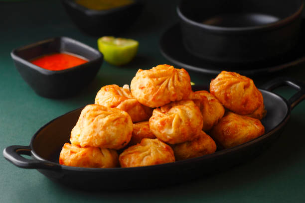 Fried momos dumpling Fried momos dumpling chinese dumpling photos stock pictures, royalty-free photos & images