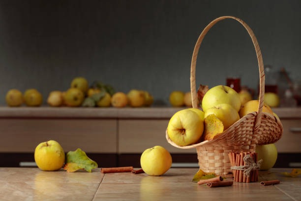 istock Fresh juicy apples in in basket and cinnamon sticks. 1341507083