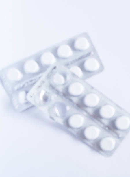 istock White tablets packed in silver blister. indoors 1341510158