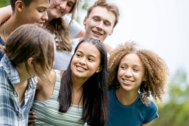 istock Teens Hanging Out on Break Outside 1341510604