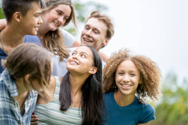 istock Teens Hanging Out on Break Outside 1341510606