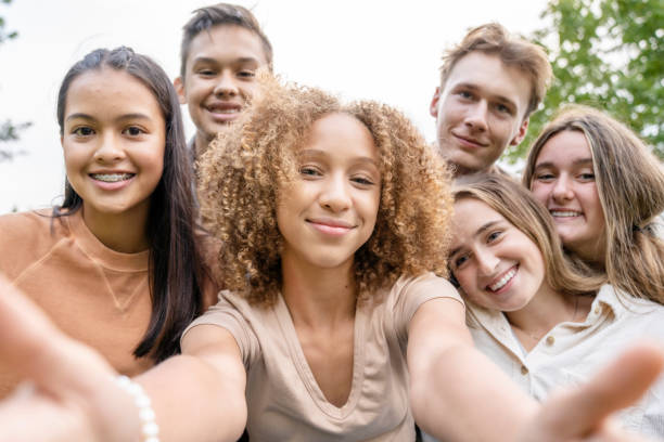 istock Multi-Ethnic Group of High School Students Taking a Selfie 1341510612