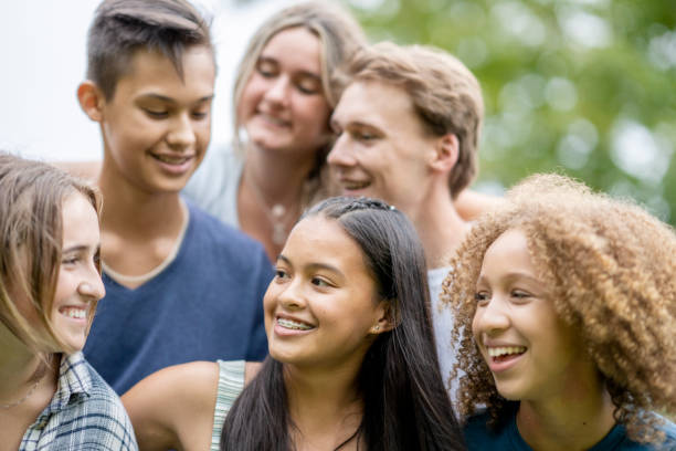 istock Teens Hanging Out on Break Outside 1341510617