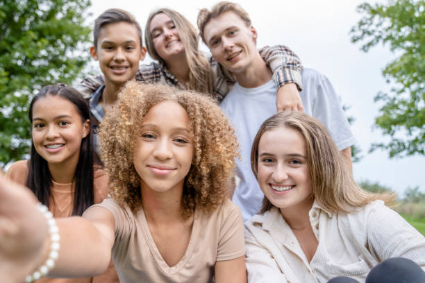 istock Multi-Ethnic Group of High School Students Taking a Selfie 1341510621