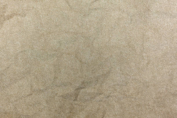 istock Rough canvas fabric, crumpled white background texture 1341513884