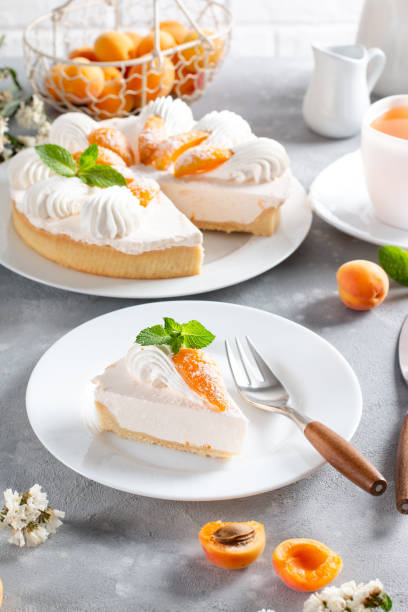 istock Cake cheesecake with apricots, summer dessert. 1341515737