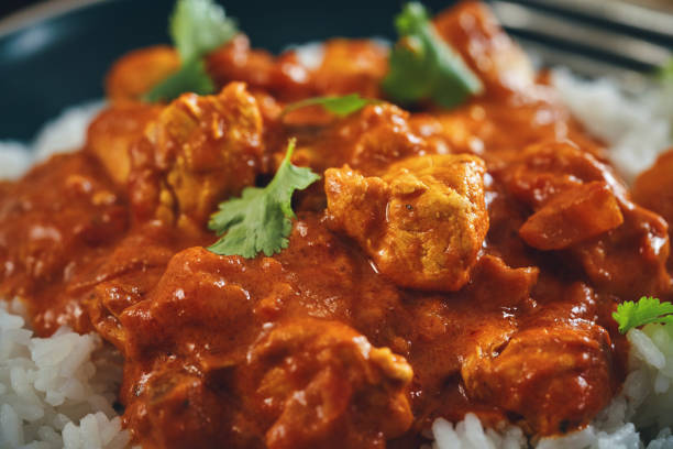 istock Indian Chicken Curry with Naan Bread and Pappadom 1341519803