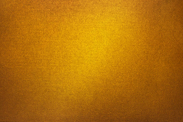 istock Soft, subtle gold background; golden paper texture 1341520495