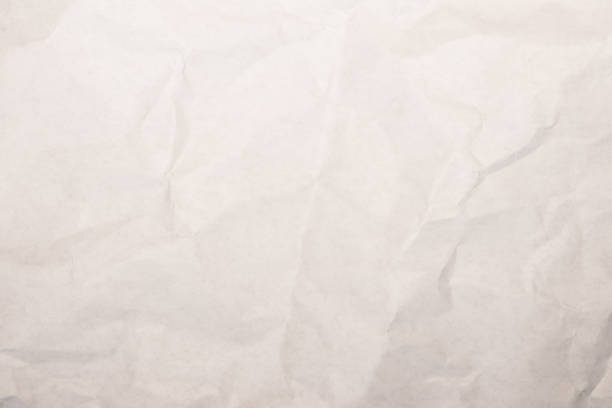 istock Crumpled paper texture, white wrinkled paper background 1341524051