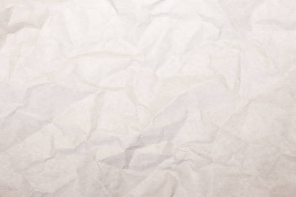 istock Crumpled paper texture, white wrinkled paper background 1341525357