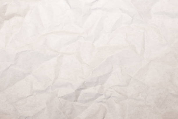 istock Crumpled paper texture, white wrinkled paper background 1341525362