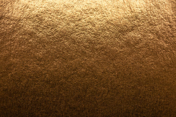 istock Metallic gold texture, bright and shiny metal textured background 1341527562