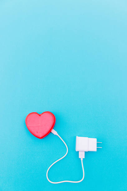 istock Red heart with usb cable connection charger , digital life concept 1341527570