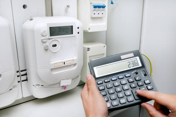 Electric meter, rising electricity prices stock photo