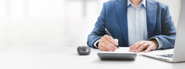 Businessman, accountant working in office stock photo