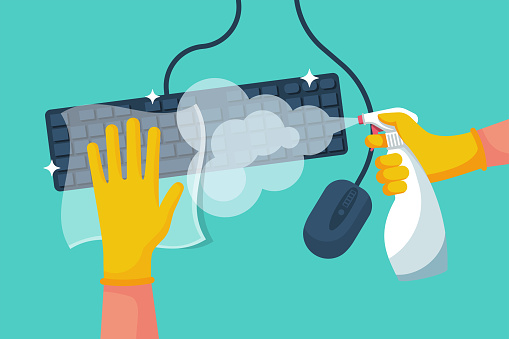 Disinfection of a computer. Man wipes the keyboard and mouse with a napkin. Cleaning surface. Hygiene home. Cleaning and disinfection. Vector illustration flat design. Housekeeping service concept.