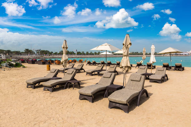 istock Sunbeds at the beach in Abu Dhabi 1341531897