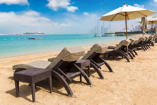istock Sunbeds at the beach in Abu Dhabi 1341531913
