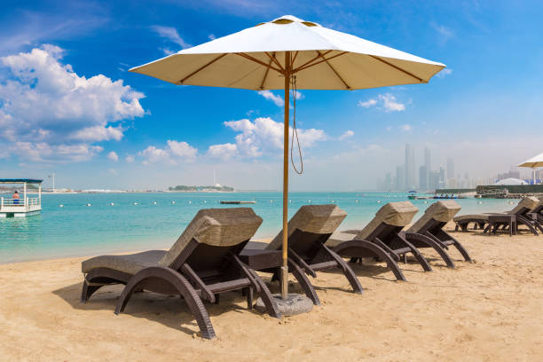istock Sunbeds at the beach in Abu Dhabi 1341532462