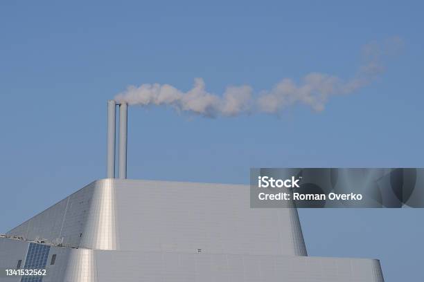 Covanta Plant Against Clear Blue Sky Stock Photo - Download Image Now