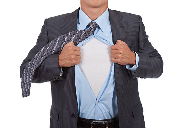 istock business man tearing off shirt 134153839