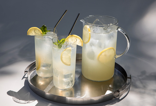 A refreshing pitcher of lemonade.